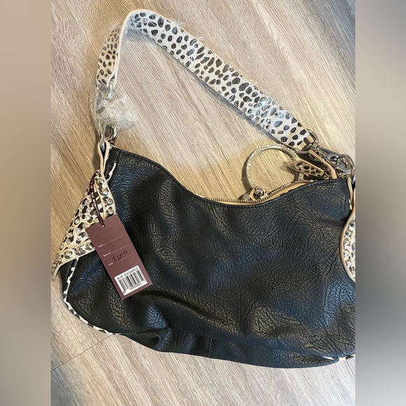 NWT. Retail $129. Purse - Picture 2 of 3